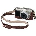 Olympus E-P1 14-42mm (Silver Body/ Black lens) plus brown leather body jacket and strap