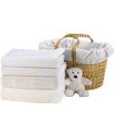 basket of cotbed sheets